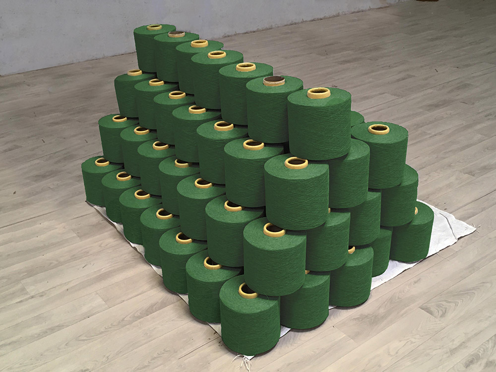 Green yarn spindles